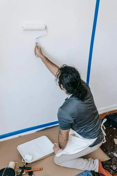 Cutting in along taped trim